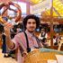 Munich, Bavaria, Germany September 19, 2026: A pretzel vendor offers large Wiesn pretzels from a carrying basket in the