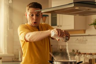 A,Person,Putting,Too,Much,Salt,In,The,Food